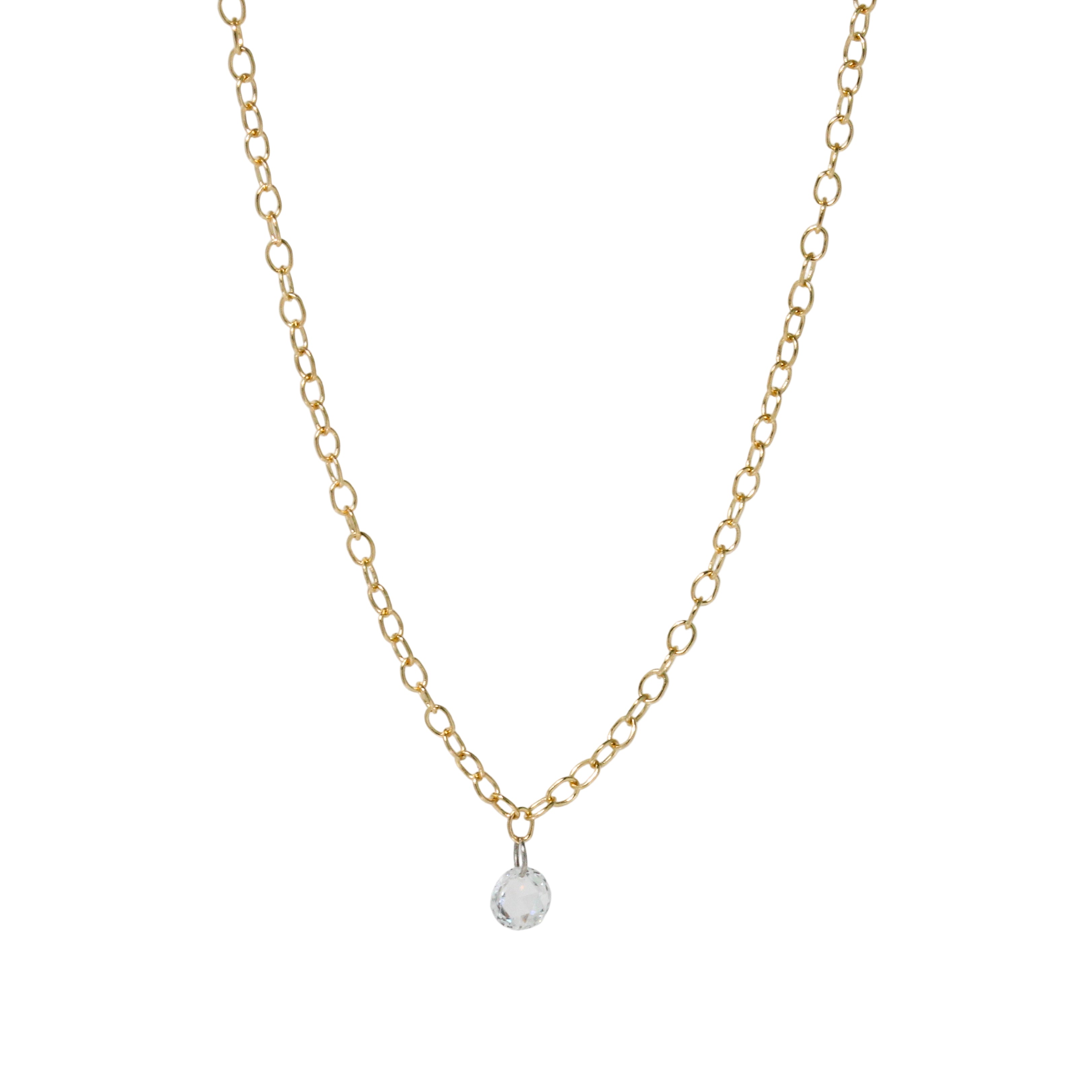 Gold chain necklace with a clear diamond pendant o white background