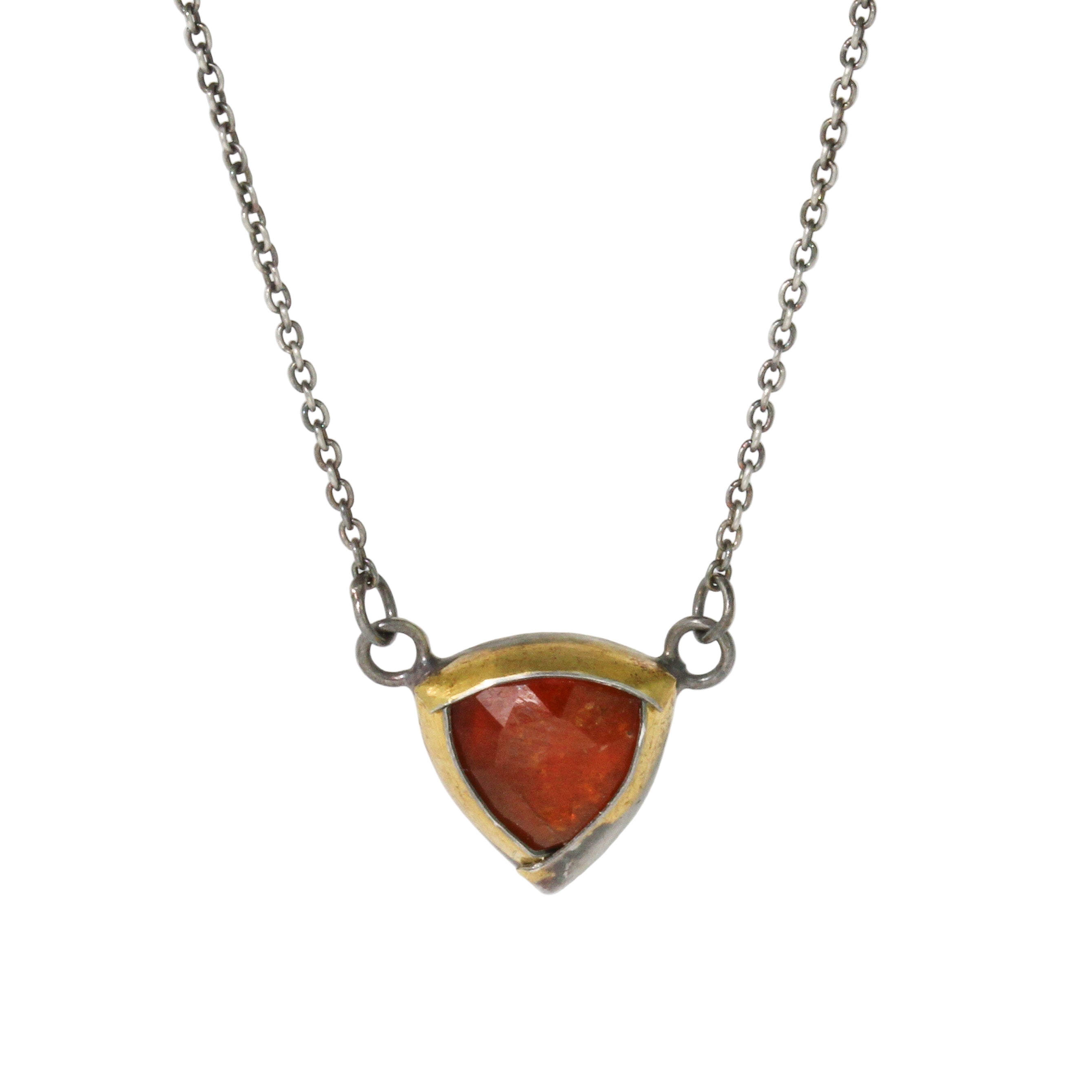 Necklace with a triangular pendant on a white background